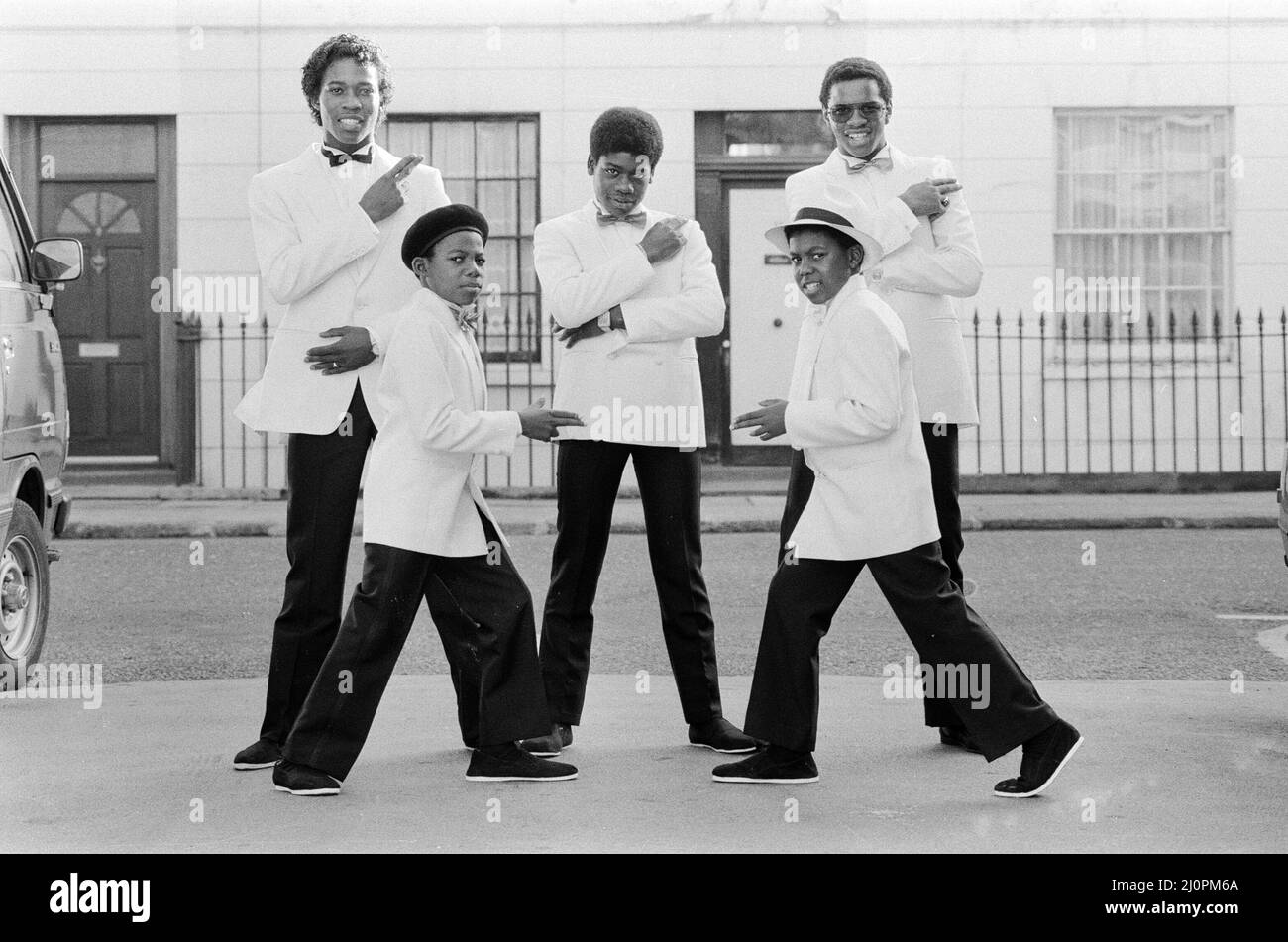 Musical Youth, British Jamaican pop / reggae group, who are currently recording the video for their lastest single titled '007', pictured 10th October 1983.  Members of the group are: Freddie Waite a.k.a. Junior, Dennis Seaton, Patrick Waite, Michael Grant & Kelvin Grant *** Local Caption *** Freddie Waite Junior Joir Dennis Seaton Patrick Waite Michael Grant Kelvin Grant Stock Photo