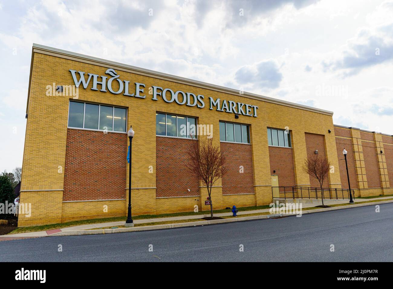 Lancaster, PA, USA - March 18, 2022: Exterior view of a Whole Foods Market. The grocery chain is a subsidiary of Amazon, and has over 500 locations, s Stock Photo