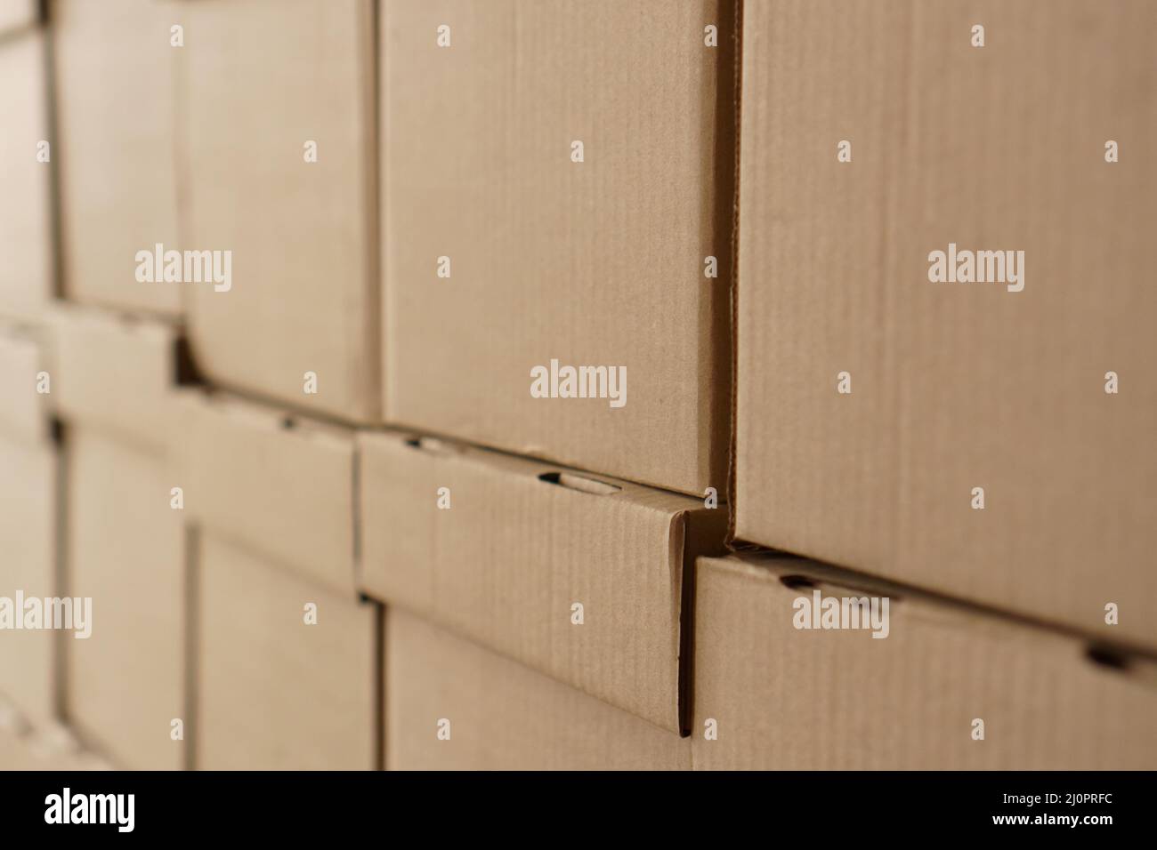 Set of cardboard brown boxes in storehouse. Background of carton boxes
