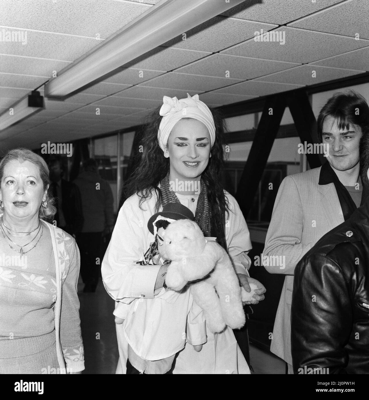 Pop group Culture Club arrive at Heathrow Airport from Madrid. Pictured, Boy George. 5th November 1983. Stock Photo