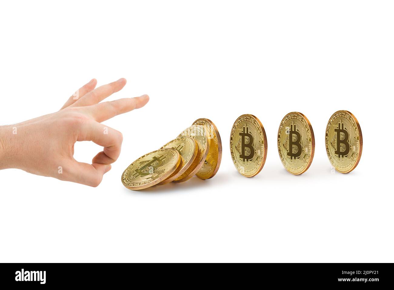 Hand and falling bitcoins Stock Photo