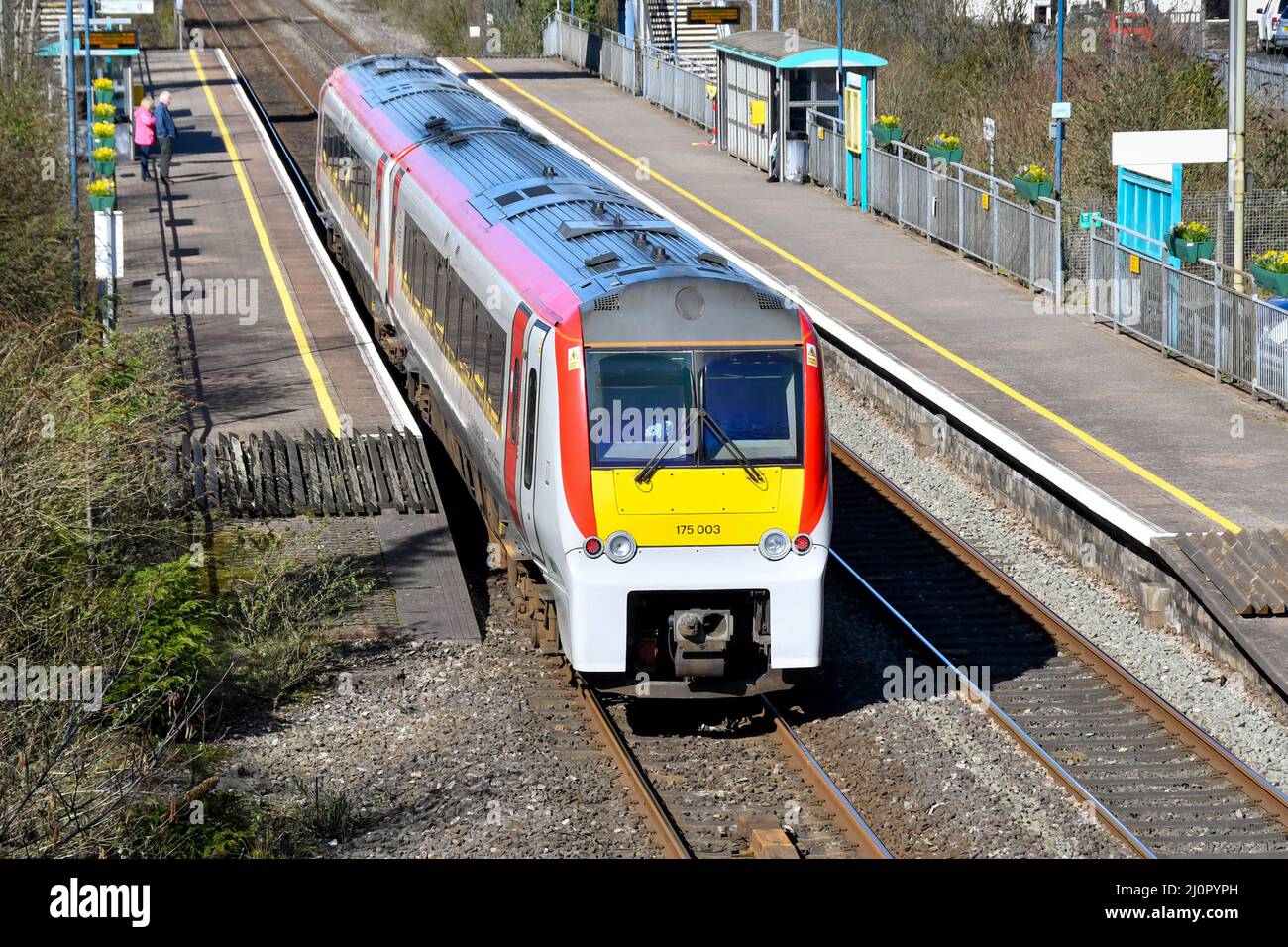 Pontyclun, Wales - March 2022:  Diesel passenger train operated by Transport for Wales arriving at the railway station in the village of Pontyclun Stock Photo