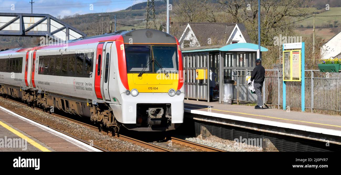 Pontyclun, Wales - March 2022:  Diesel passenger train operated by Transport for Wales arriving at the railway station in the village of Pontyclun Stock Photo