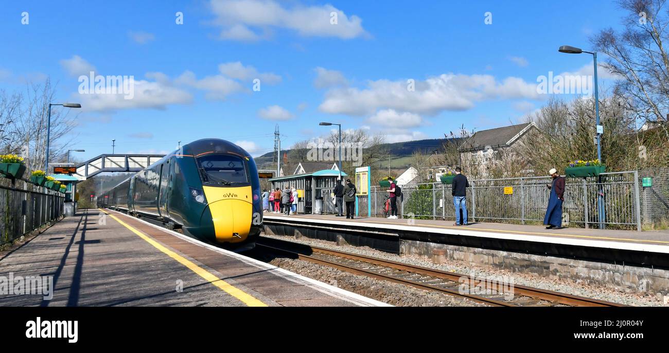 Pontyclun, Wales - March 2022:  High speed train operated by Great Western Railway passing through the railway station in the village of Pontyclun Stock Photo