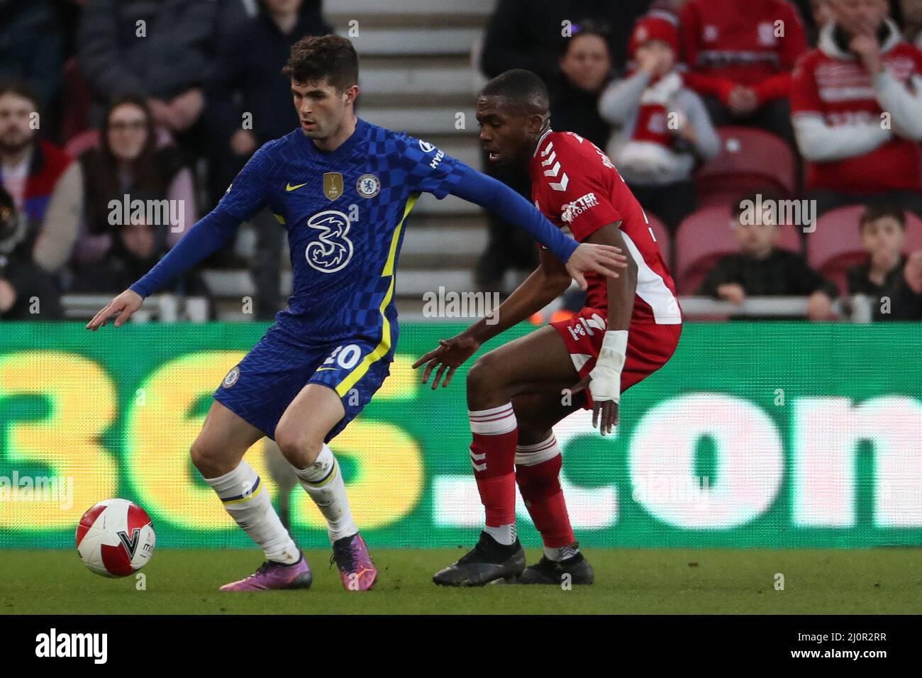 MIDDLESBROUGH, UK. MAR 19TH Chelsea's Christian Pulisic in action with Middlesbrough's Anfernee Dijksteel during the FA Cup match between Middlesbrough and Chelsea at the Riverside Stadium, Middlesbrough on Saturday 19th March 2022. (Credit: Mark Fletcher | MI News) Credit: MI News & Sport /Alamy Live News Stock Photo