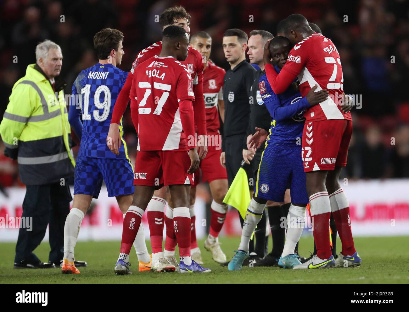 MIDDLESBROUGH, UK. MAR 19TH Middlesbrough's Souleymane Bamba hugs Chelsea's Ngolo Kante after the final whistle of the FA Cup match between Middlesbrough and Chelsea at the Riverside Stadium, Middlesbrough on Saturday 19th March 2022. (Credit: Mark Fletcher | MI News) Credit: MI News & Sport /Alamy Live News Stock Photo