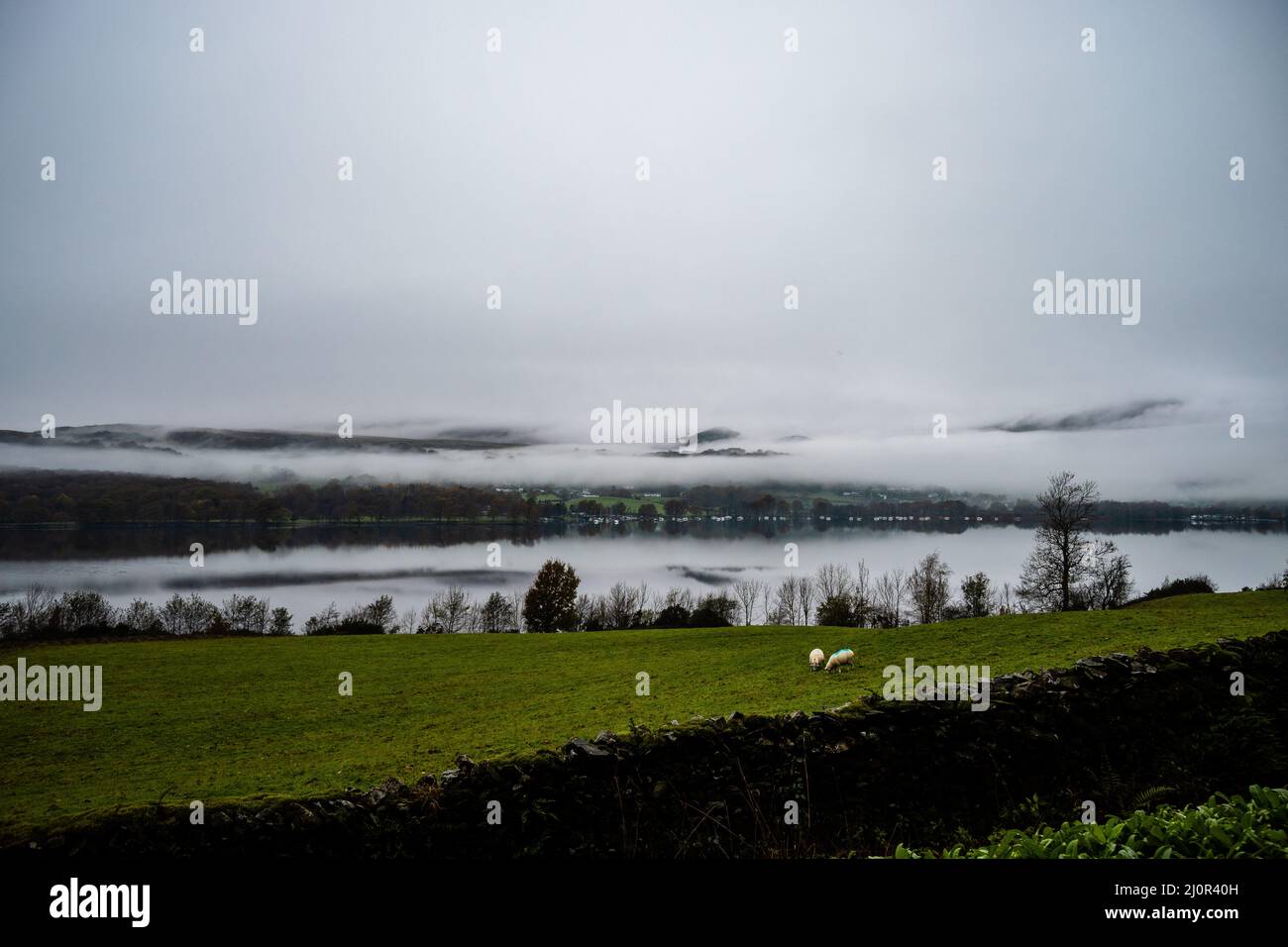 Cloud inversion over a lake in Lake district UK Stock Photo - Alamy