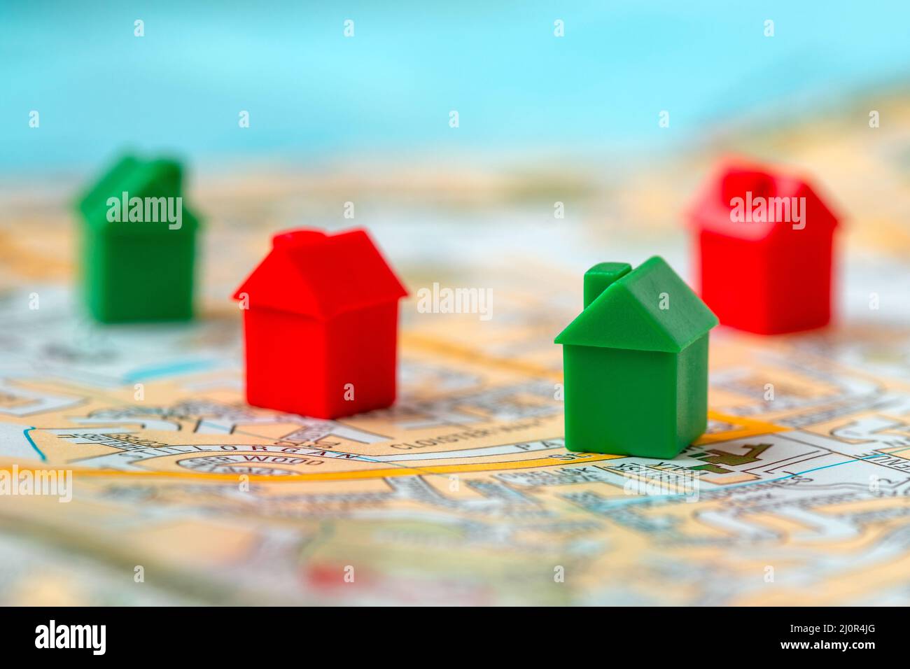 Map with group of small cute miniature houses Stock Photo - Alamy