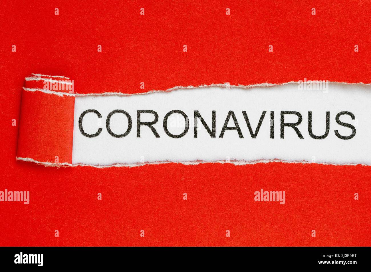 Top view of red torn paper and the text CORONAVIRUS Stock Photo - Alamy
