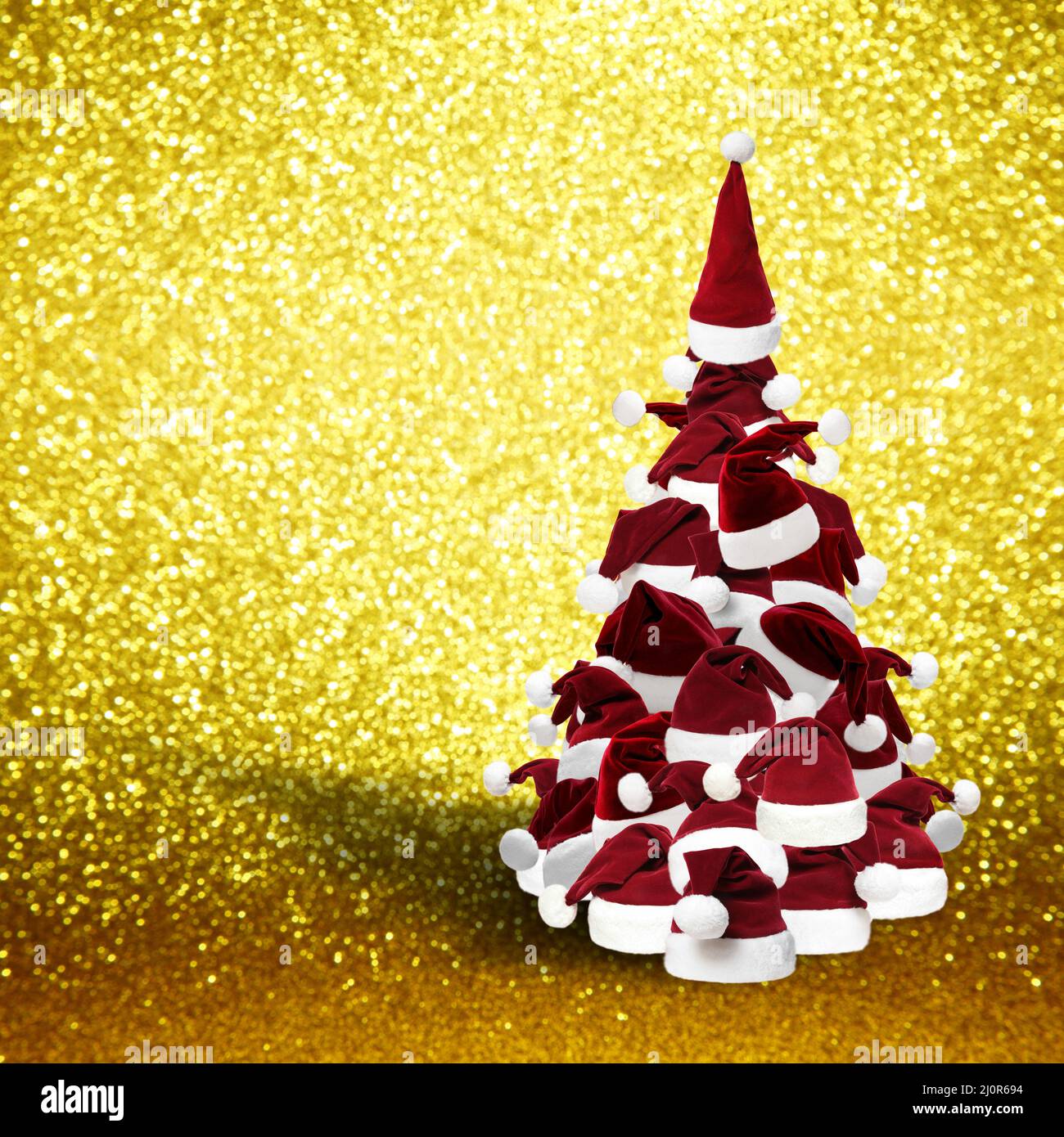 Merry Christmas concept with christmas tree and christmas hats Stock Photo