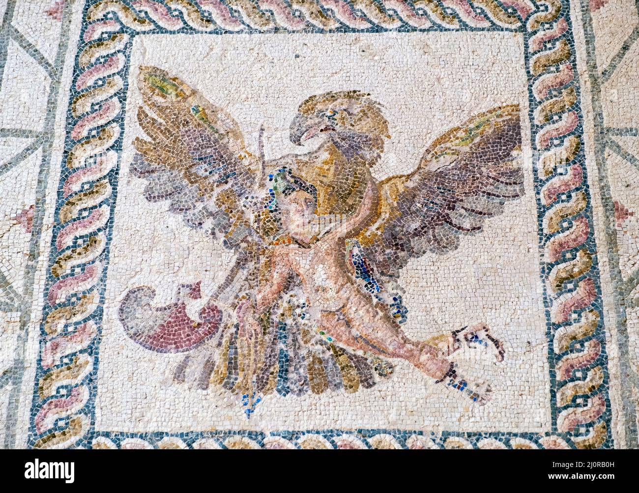 Roman floor mosaic of Ganymede and the Eagle in the House of Dionysos, Paphos, Cyprus Stock Photo