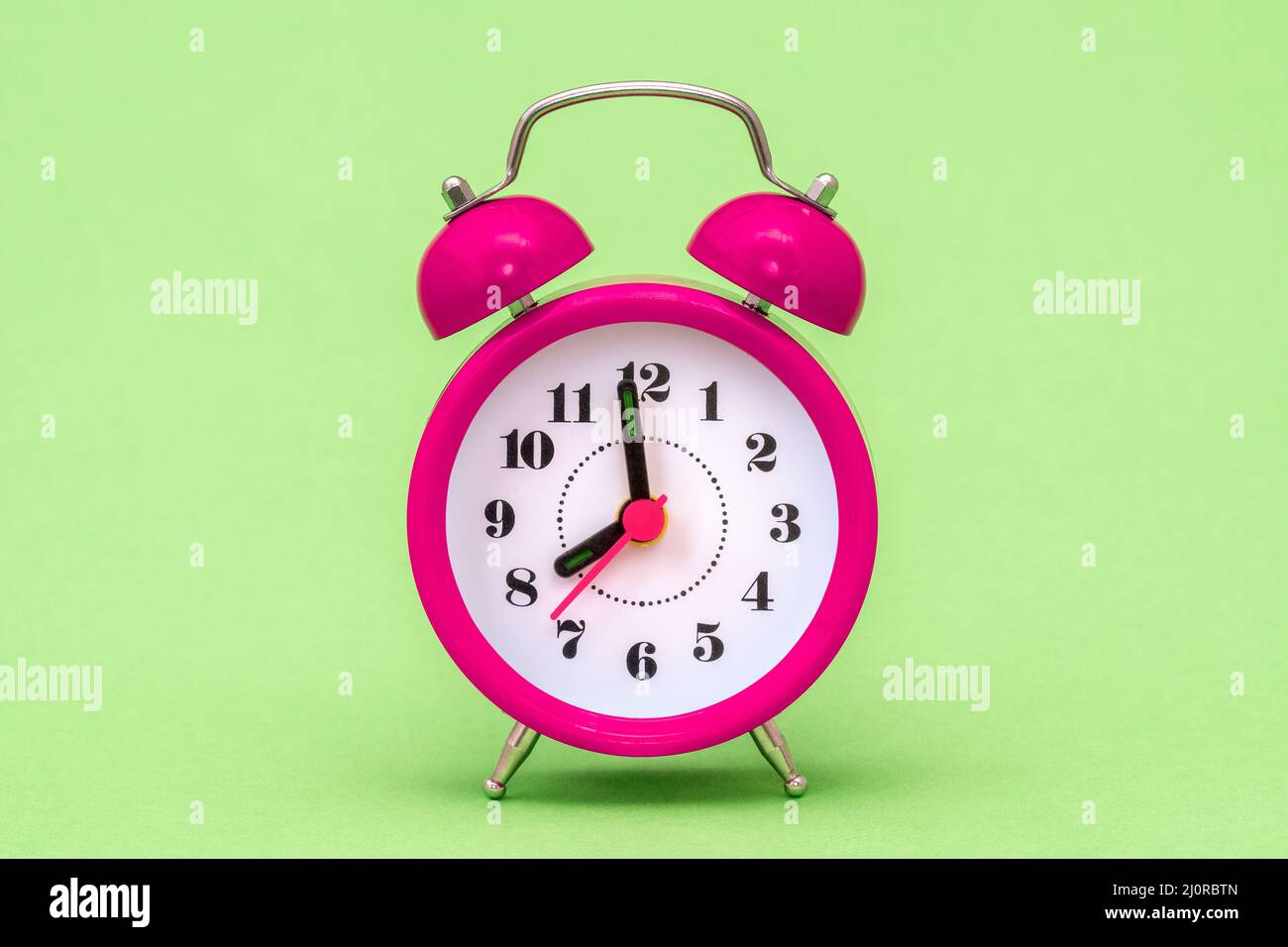 Old fashioned purple alarm clock Stock Photo Alamy
