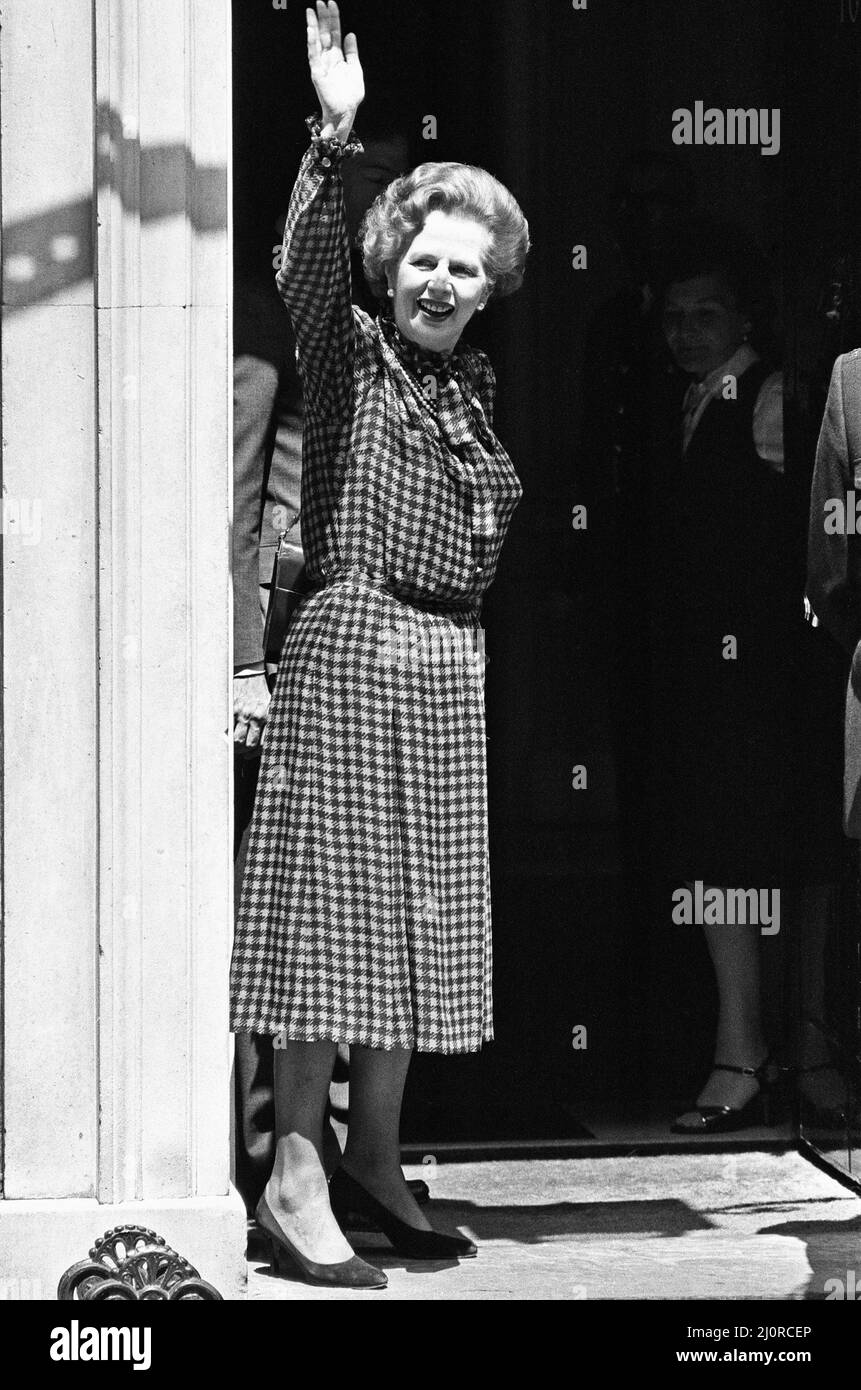Prime Minister Margaret Thatcher  on the steps of 10 Downing Street waving to the crowds of well wishers after her landslide victory in the General Election. 10th June 1983 Stock Photo