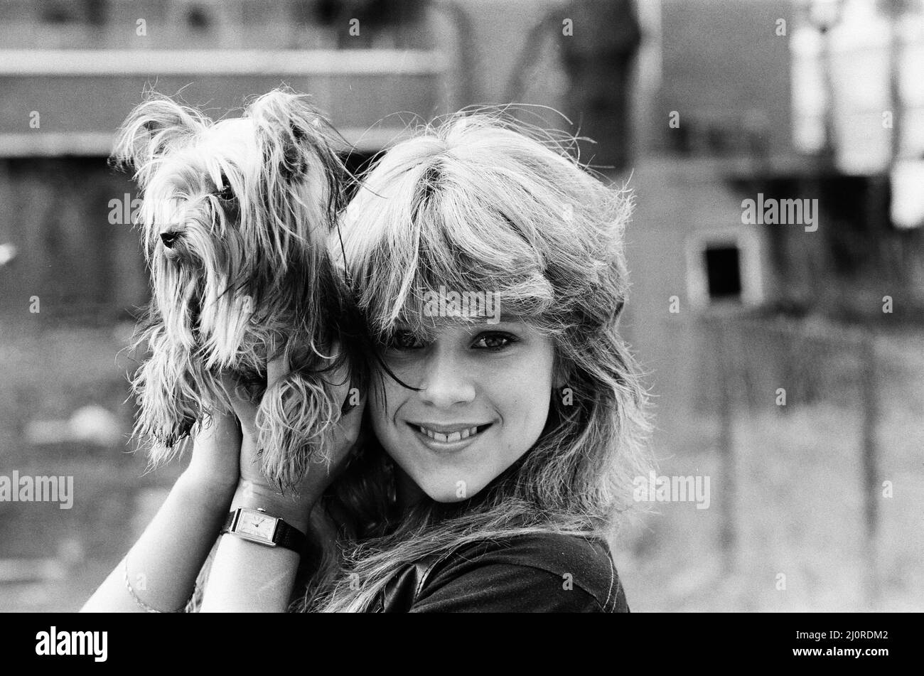 Samantha Fox contestant Miss Sunday People competition, aged 16 years old, pictured with pet dog at home January 1983.  a.k.a.  Sam Fox  *** Local Caption *** Sam Fox Stock Photo