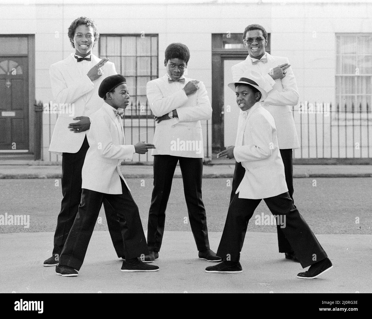 Musical Youth, British Jamaican pop / reggae group, who are currently recording the video for their lastest single titled '007', pictured 10th October 1983.  Members of the group are: Freddie Waite a.k.a. Junior, Dennis Seaton, Patrick Waite, Michael Grant & Kelvin Grant *** Local Caption *** Freddie Waite Junior Joir Dennis Seaton Patrick Waite Michael Grant Kelvin Grant Stock Photo
