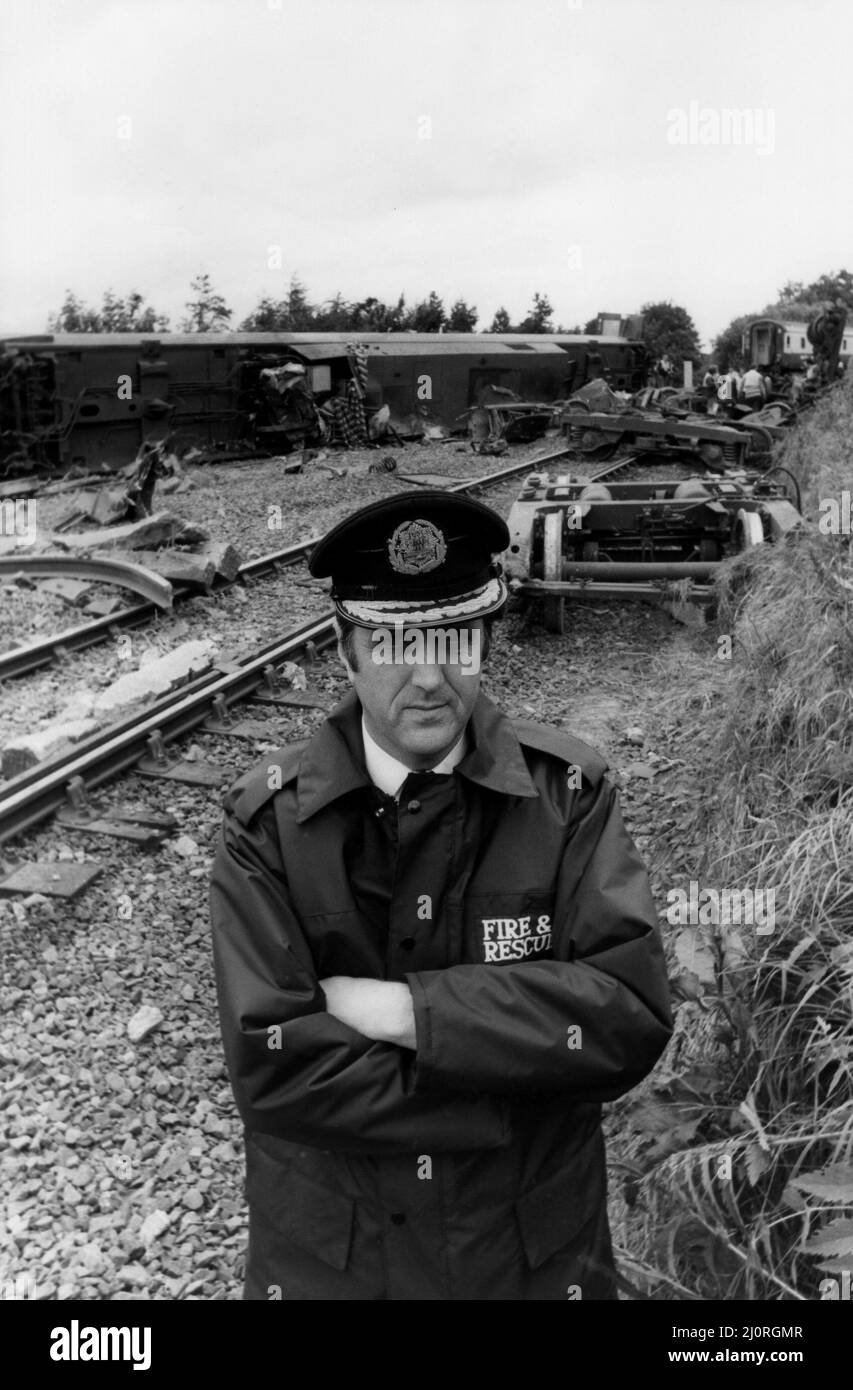The crash of the Aberdeen to London sleeper train which careered off the track on the notorius Morpeth curve, just half a mile from the station. The crash happened at 10 minutes past midnight on 24th June, 1984   Fire officer Dennis Mee at the scene of the crash Stock Photo