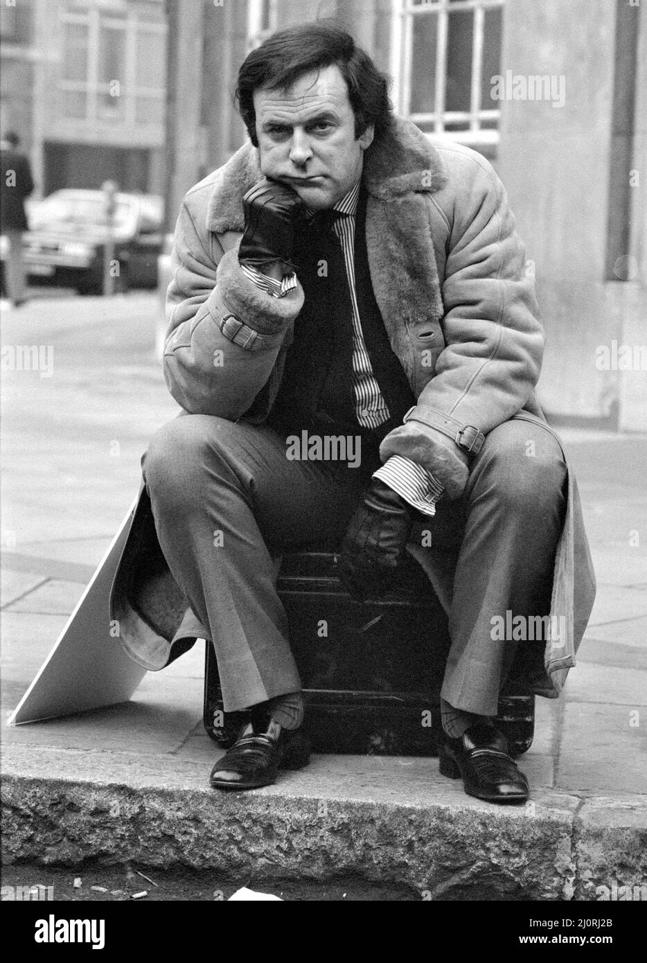 Disc jockey Terry Wogan after being escorted off BBC premises, Broadcasting House, after recording his final programme for BBC Radio Two in December 1984.   Terry Wogan will soon begin filming for a new bbc 1 chat show simply called Wogan. *** Local Caption *** DJ Stock Photo