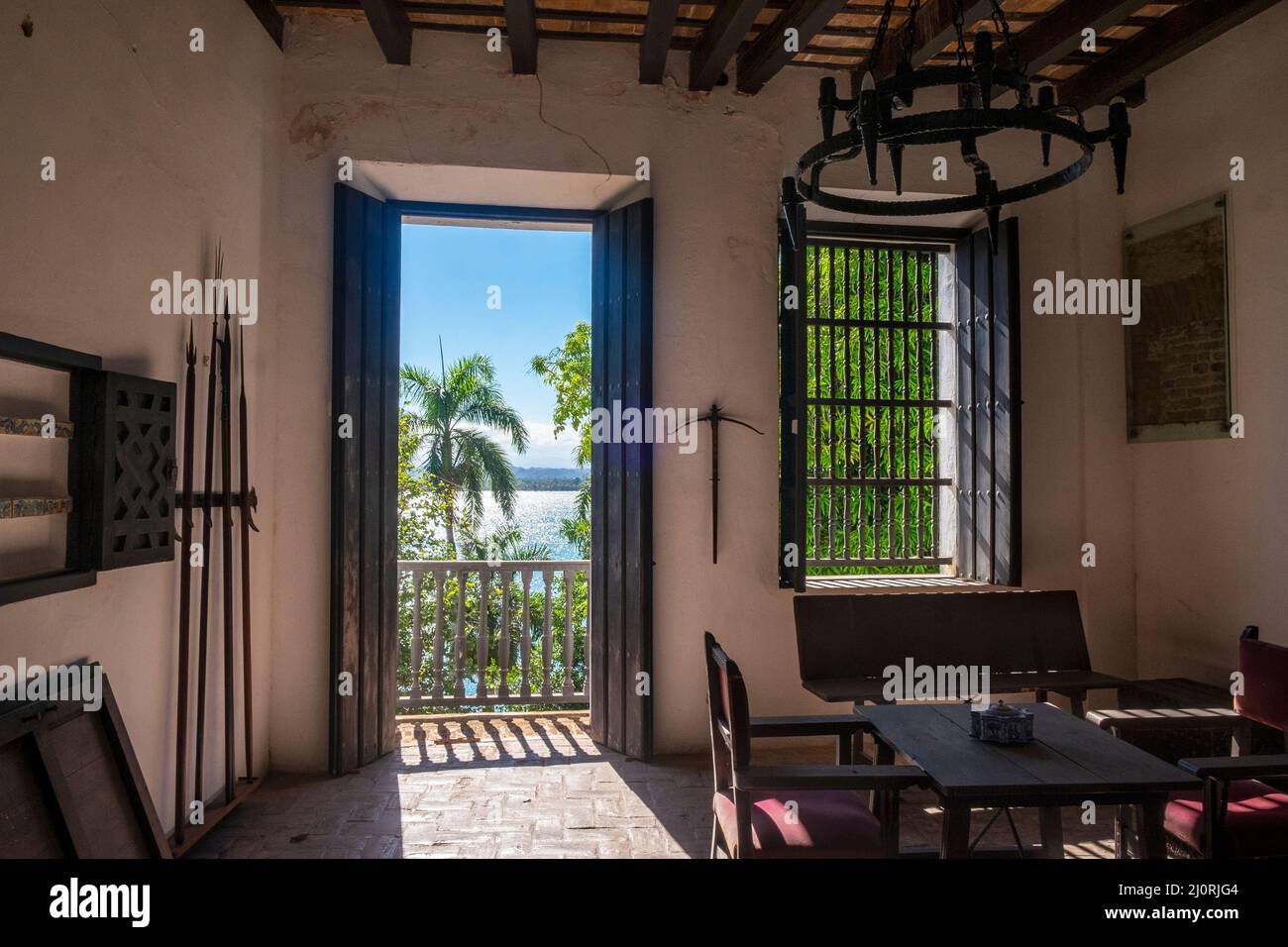 Historical weaponry in a room at La Casa Blanca, home of the Ponce de León family, San Juan