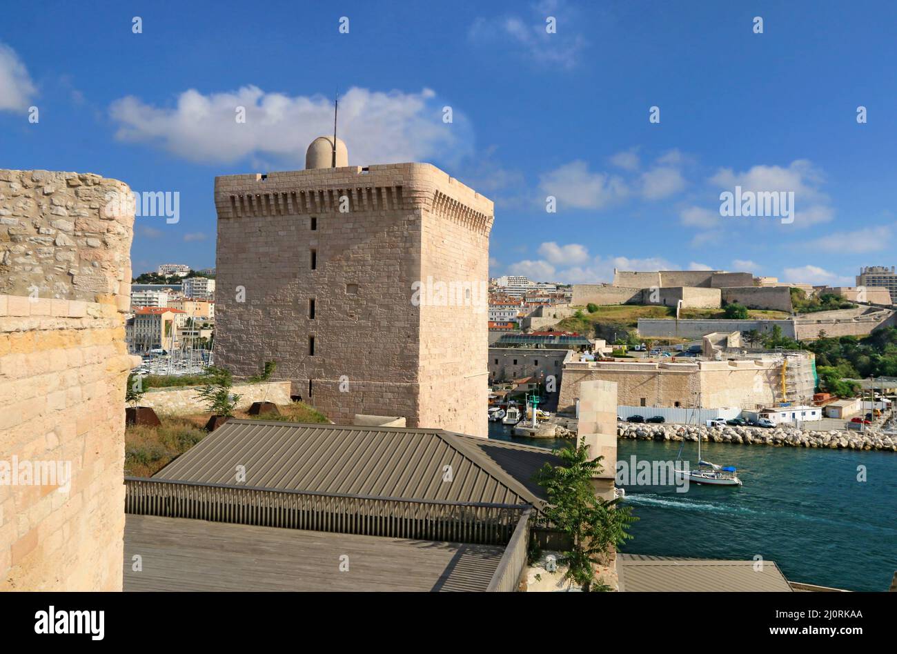 Tower of King René at Fort Saint-Jean, and Vieux -Port in the background Stock Photo