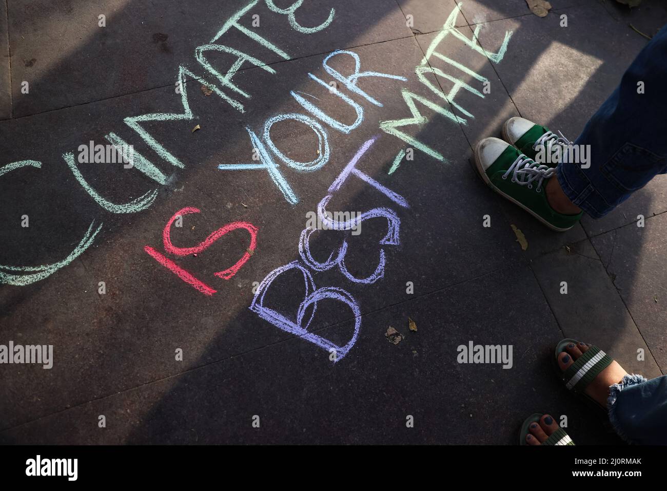 New Delhi, New Delhi, India. 20th Mar, 2022. Climate activists draw an awareness message calling for urgent measures to combat climate change. (Credit Image: © Karma Sonam Bhutia/ZUMA Press Wire) Stock Photo