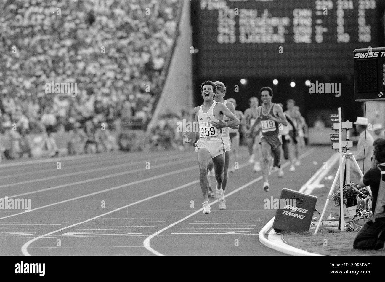 1984 Olympic Games in Los Angeles, USA.Mens Athletics. Great Britain's Sebastain Coe wins the 1500 metres gold medal ahead of his fellow countryman Steve Cram who took silver. 11th August 1984. Stock Photo