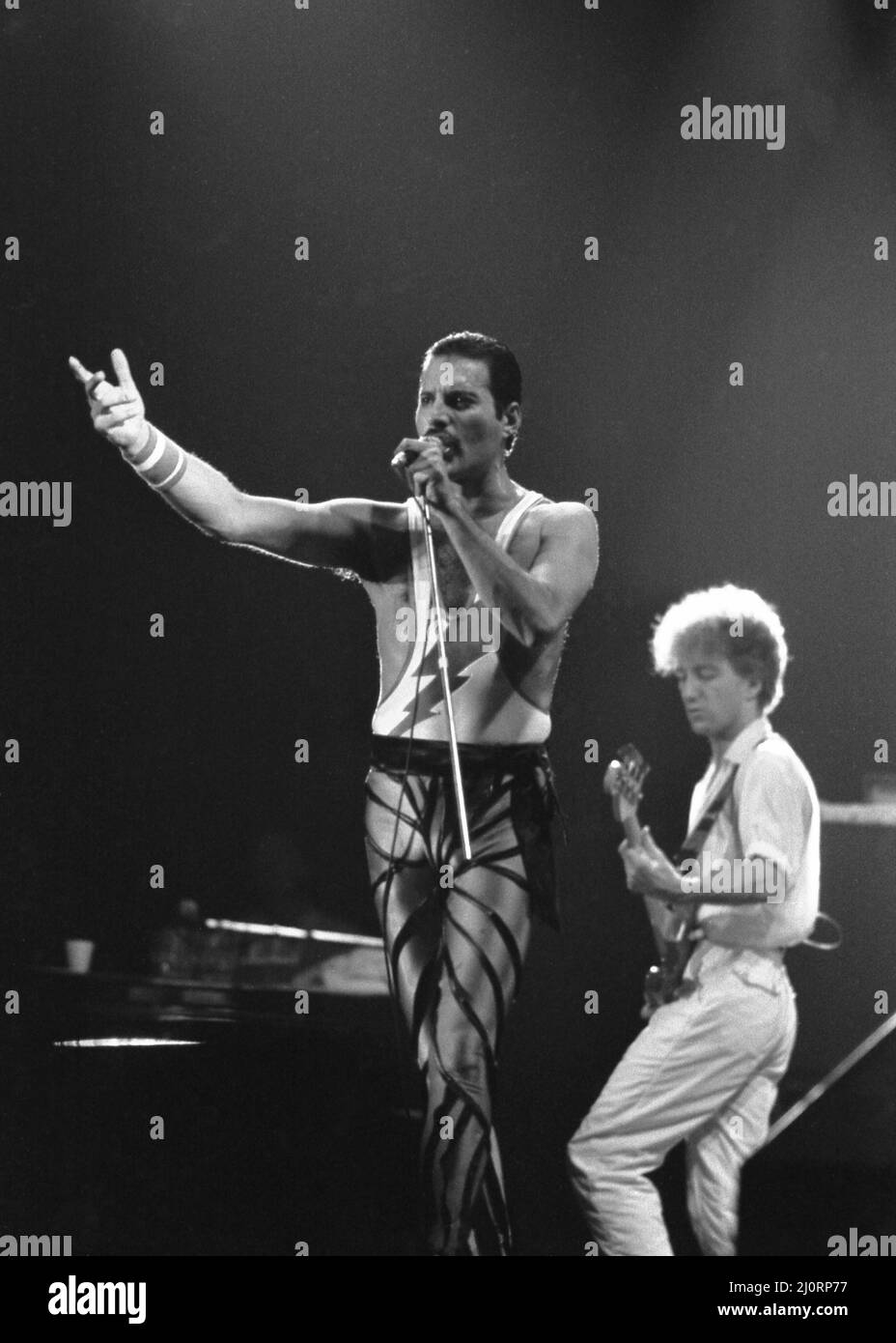 Freddie Mercury, lead singer of rock group Queen, delighted a packed audience. The concert took