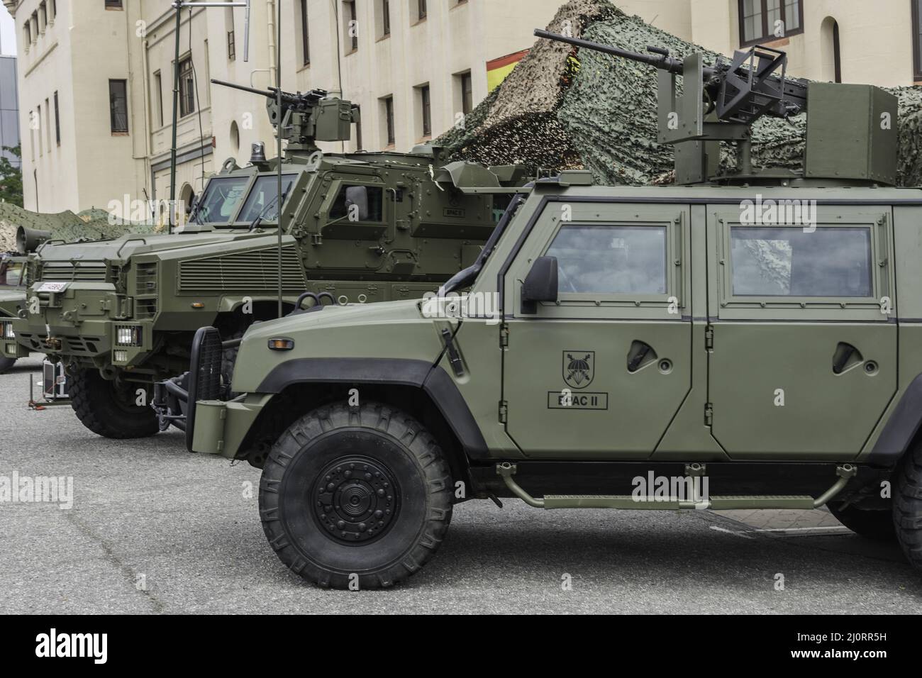 Green strong 4x4 off-road truck of Spanish army, Iveco LMV Stock Photo