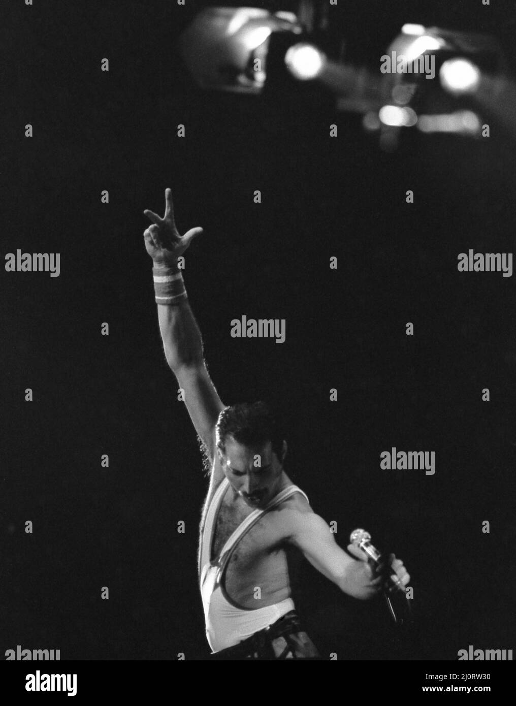 Freddie Mercury, lead singer of rock group Queen, delighted a packed audience. The concert took