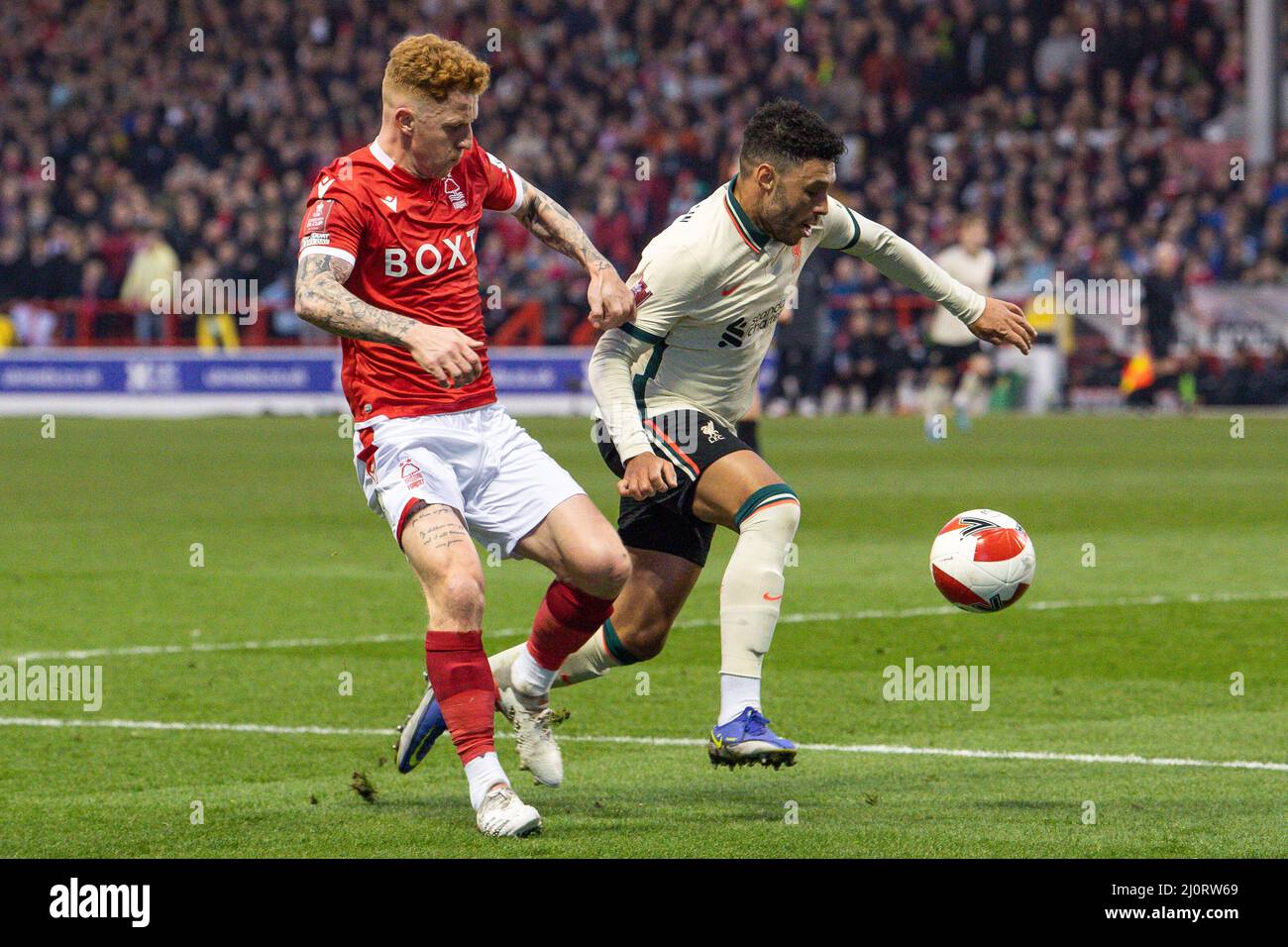 Alex Oxlade-Chamberlain #15 of Liverpool breaks past Jack Colback #8 of