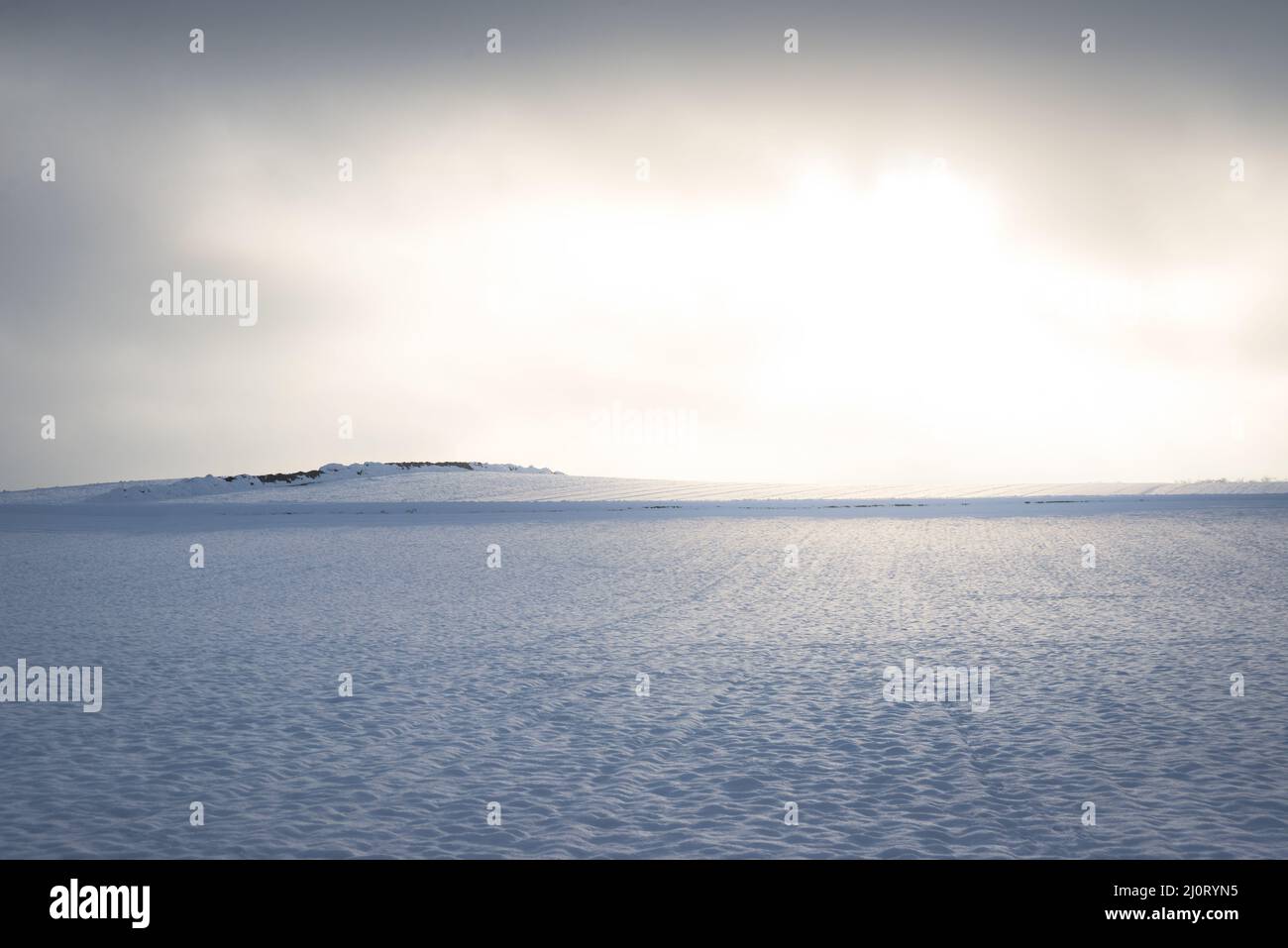 Field of snow with sky Stock Photo - Alamy