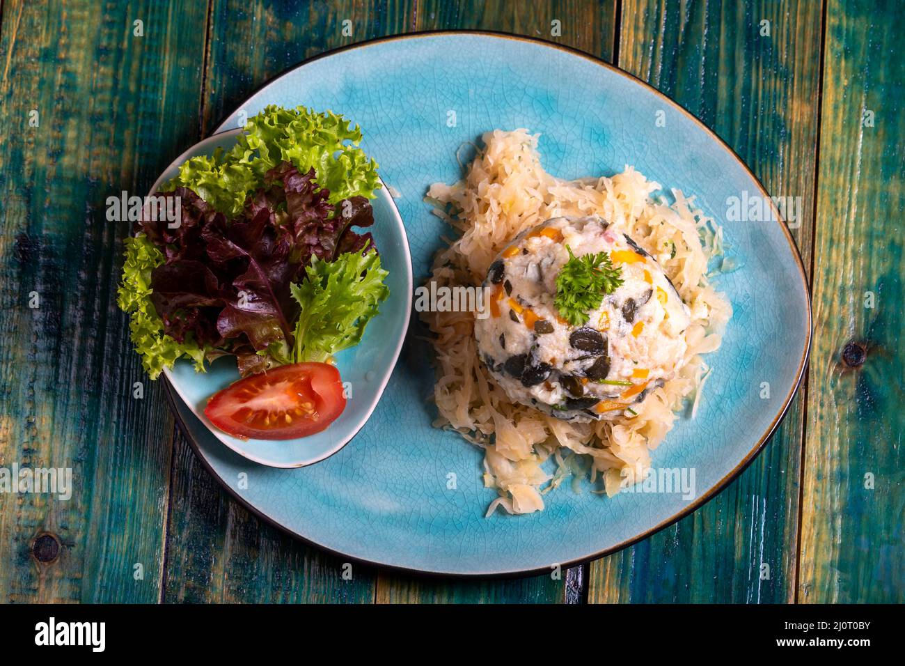 austrian bread dumpling on sauerkraut Stock Photo