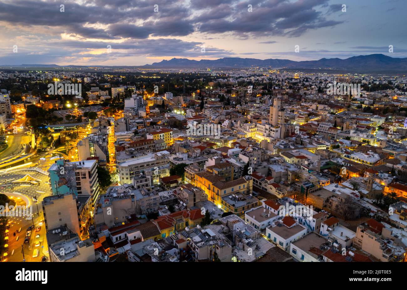 Aerial drone photograph of cityscape of Nicosia in Cyprus at sunset Stock Photo