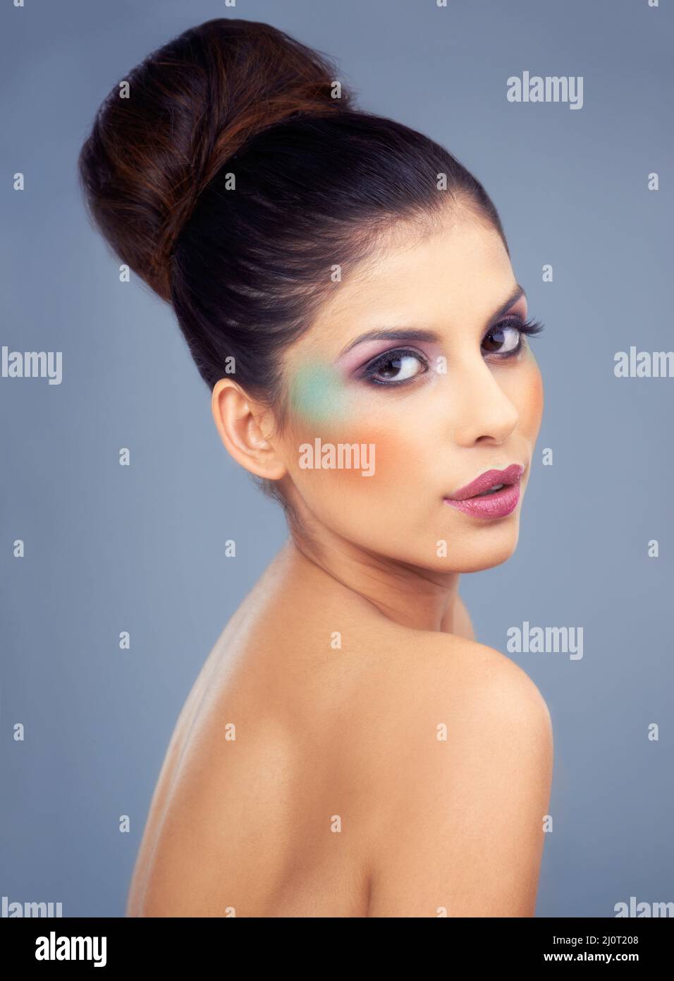 She uses makeup to highlight her best features. Cropped shot of a beautiful young woman wearing bold makeup. Stock Photo