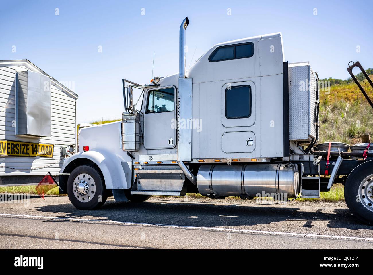Powerful classic big rig semi truck tractor equipped to transport ...
