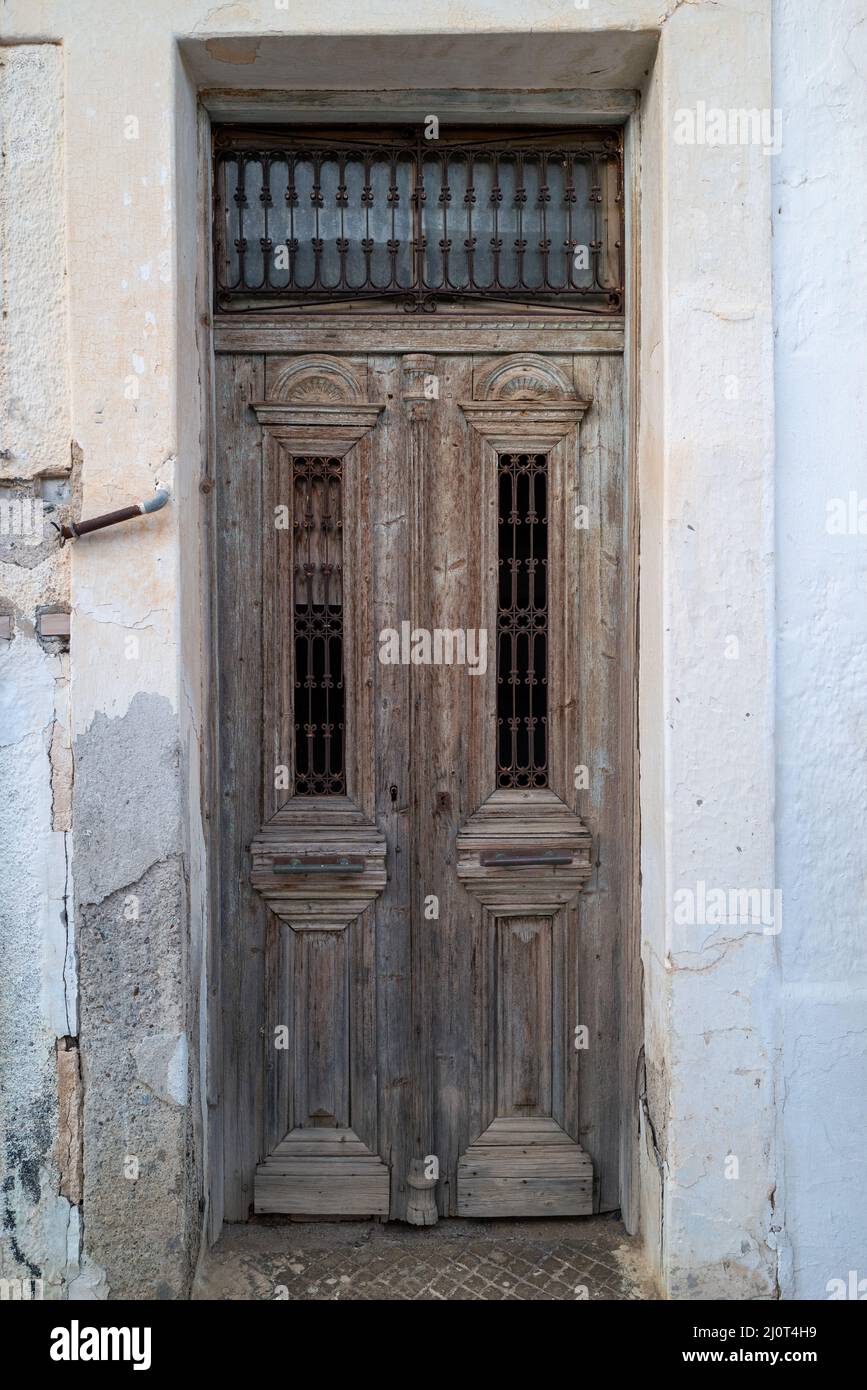 Old doors and windows in different towns on Crete, Greece Stock Photo