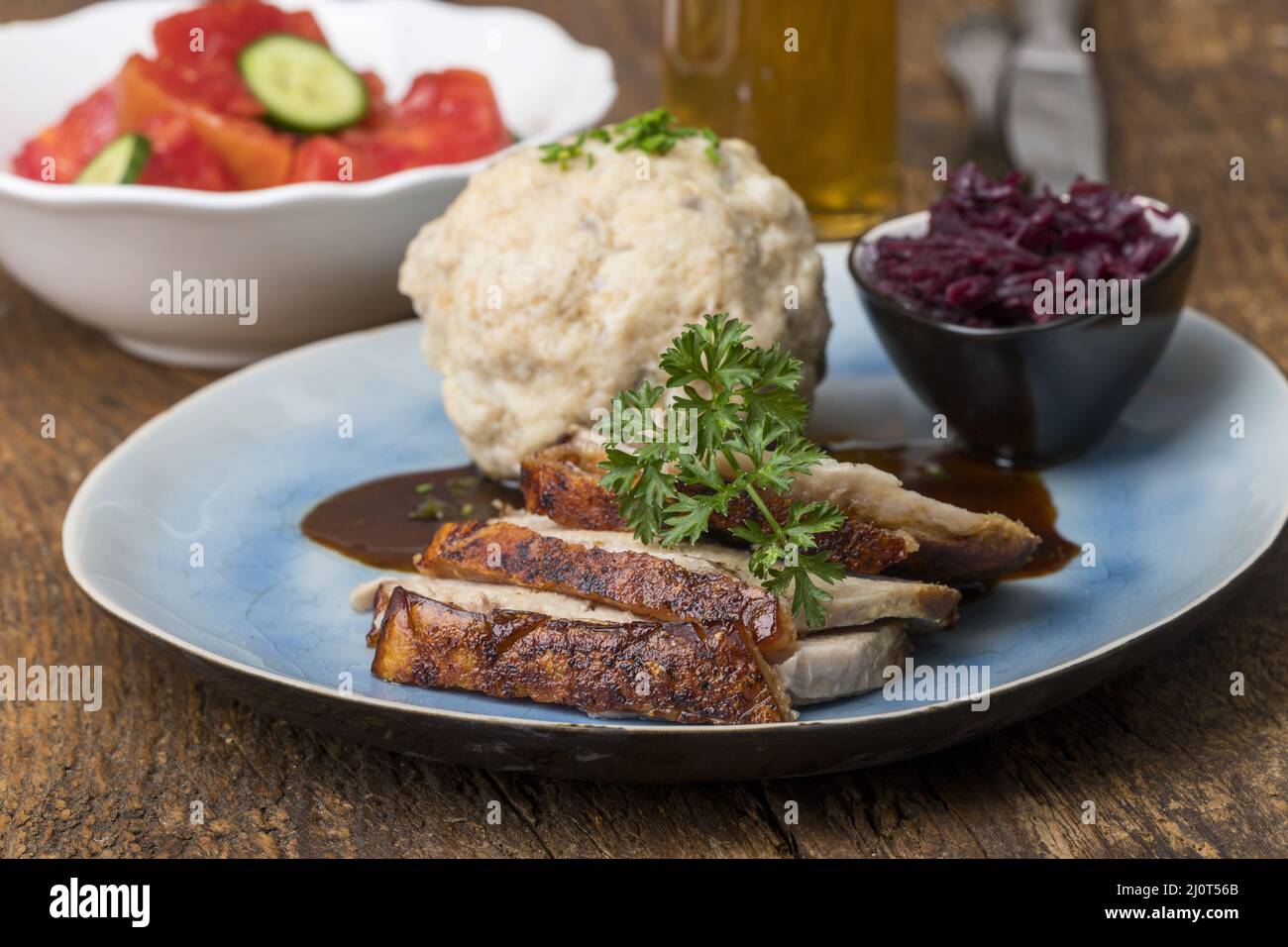 Bavarian roast pork with bread dumpling Stock Photo