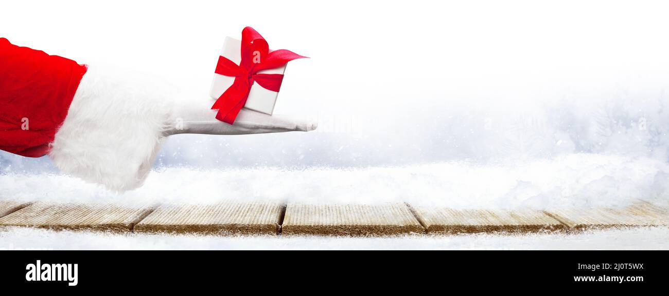 Santa claus wrapped present hi-res stock photography and images - Alamy