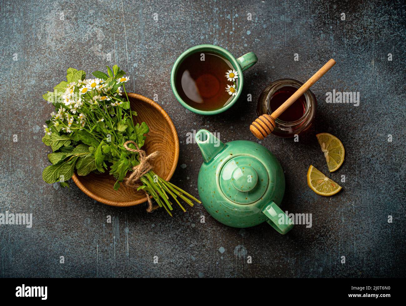 Herbal tea with natural healing medical herbs, tea cup, tea pot top view Stock Photo