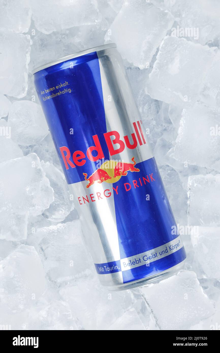 Red Bull Energy Drink Lemonade Soft Drink Drink In Can On Ice Ice Cube High Format Stock Photo