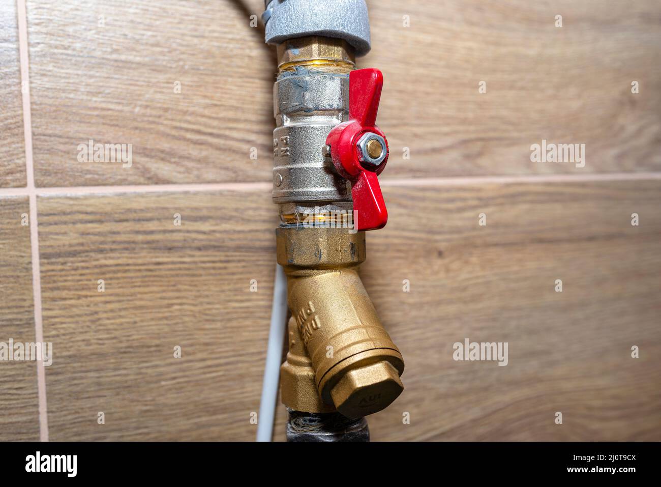 Open water valves connecting to the gas boiler in a modern home boiler