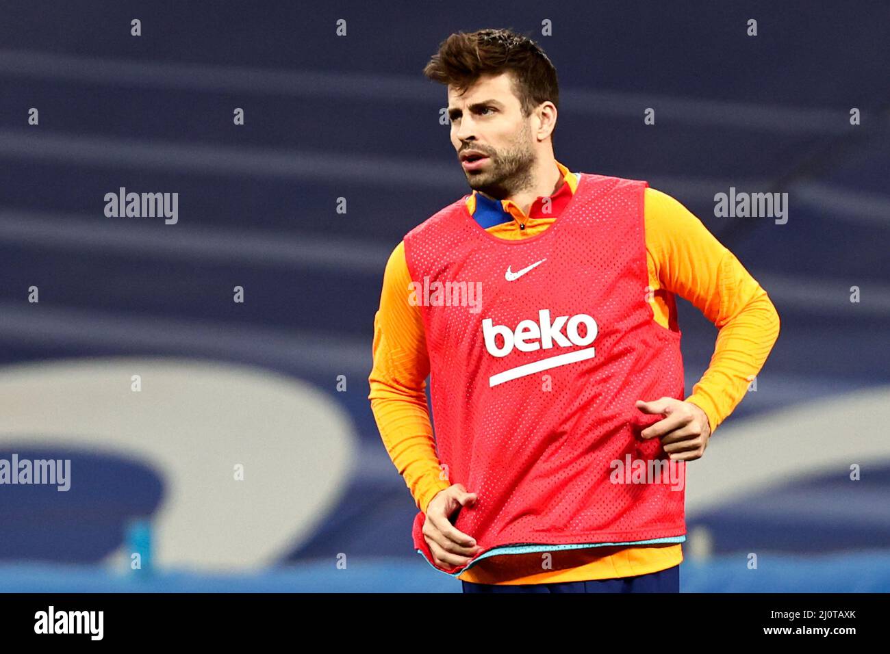 MADRID, SPAIN - MARCH 20: Gerard Pique of FC Barcelona warming up during the Spanish La Liga Santander match between Real Madrid and FC Barcelona at Estadio Santiago Bernabéu on March 20, 2022 in Madrid, Spain (Photo by DAX Images/Orange Pictures) Credit: Orange Pics BV/Alamy Live News Stock Photo