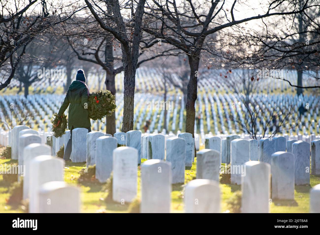 Volunteers participate in the Wreaths Across America’s cleanup day