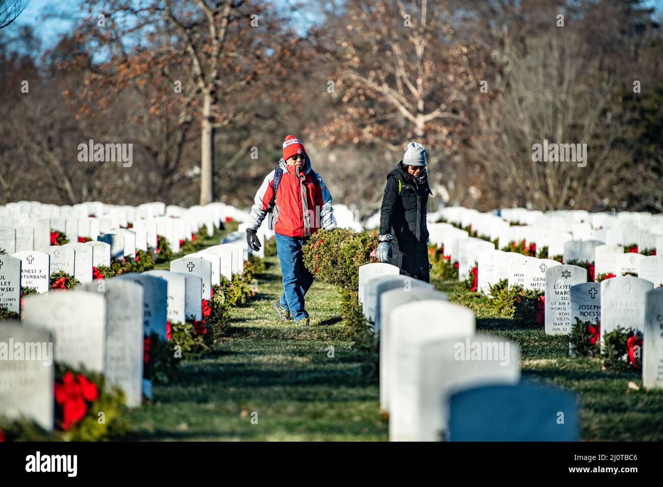Volunteers participate in the Wreaths Across America’s cleanup day
