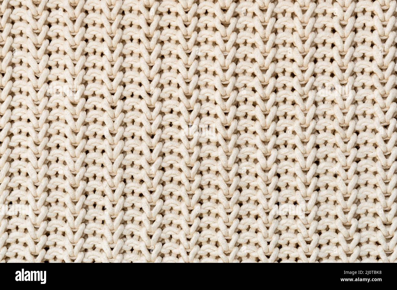 White felt background. Surface of fabric texture in cream color. Stock  Photo