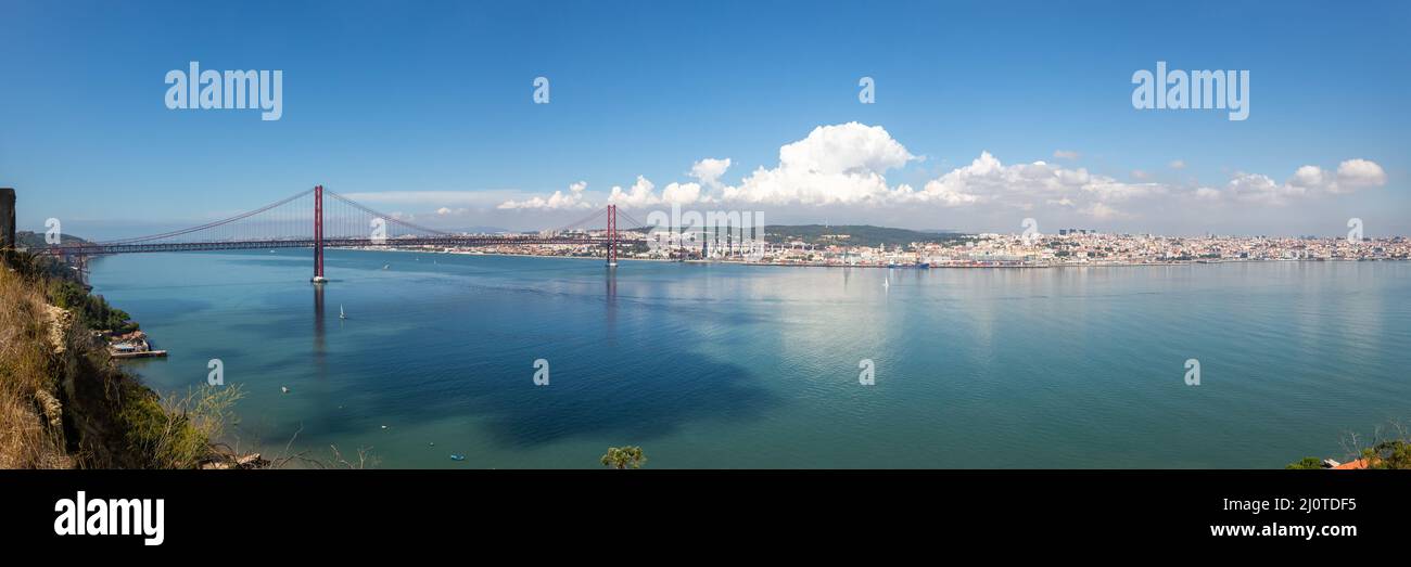 Lisbon Portugal bridge Ponte 25 de Abril over river Tejo panorama travel travel city Stock Photo