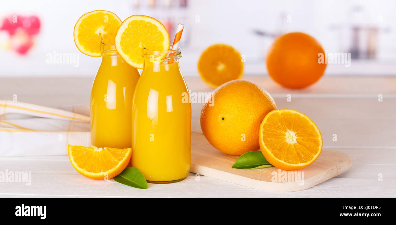 Orange juice orange juice drink bottle fruit juice panorama Stock Photo