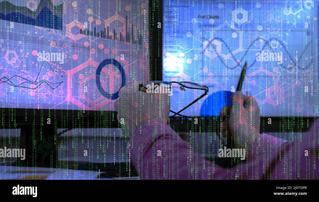 A man sitting on the computer analyzing data with matrix codes on the screen, analytics, data computing, artificial intelligence concept Stock Photo