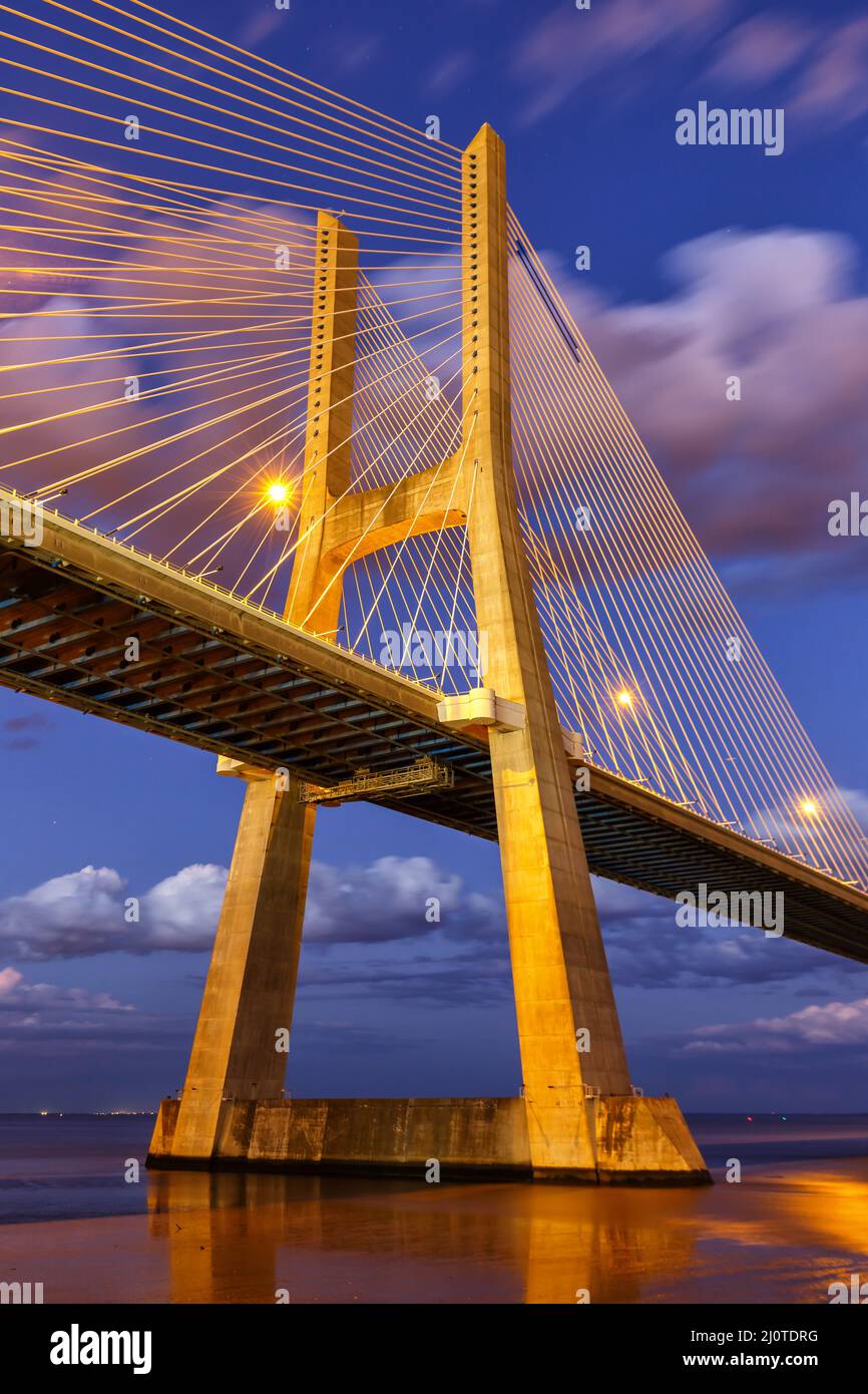 Lisbon Portugal bridge Ponte Vasco da Gama over river Tejo travel travel city portrait format Stock Photo