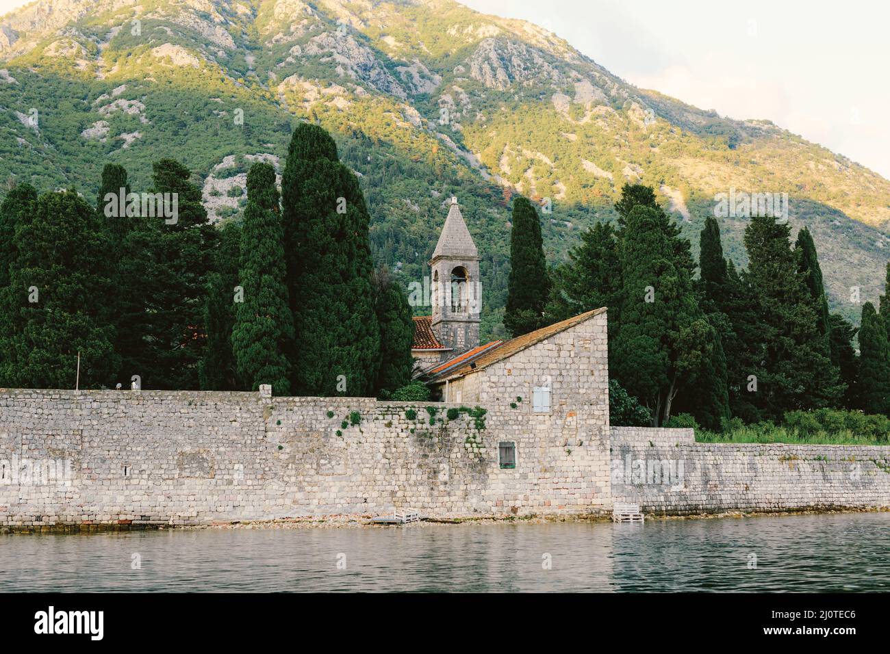 High brick walls around the monastery on the island of St. George. Montenegro Stock Photo
