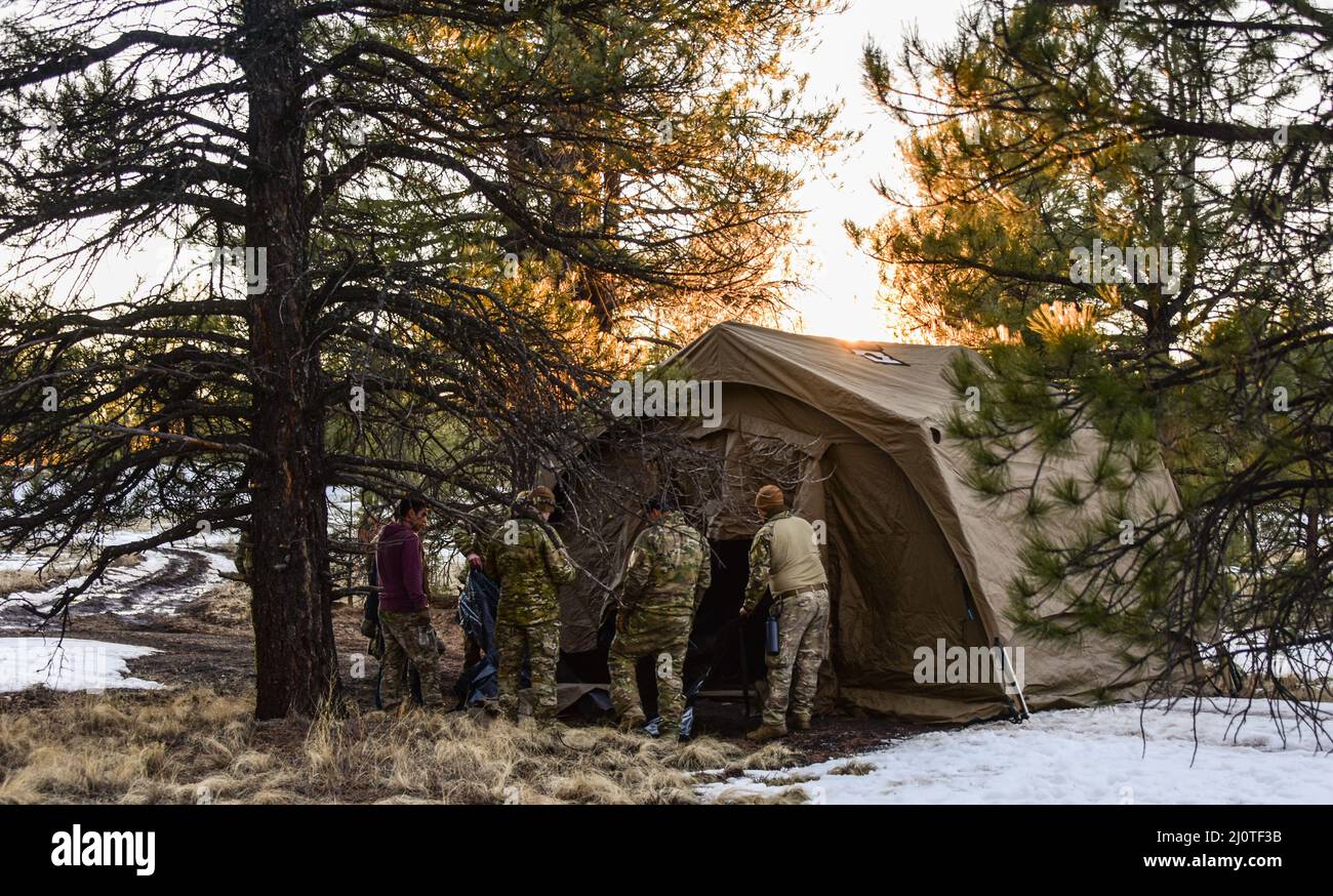 U.S. Airmen assigned to the 55th Rescue Squadron set up a tent at Camp Navajo in Flagstaff